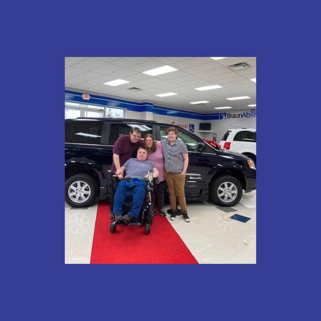 The Conrad family with their new vehicle.